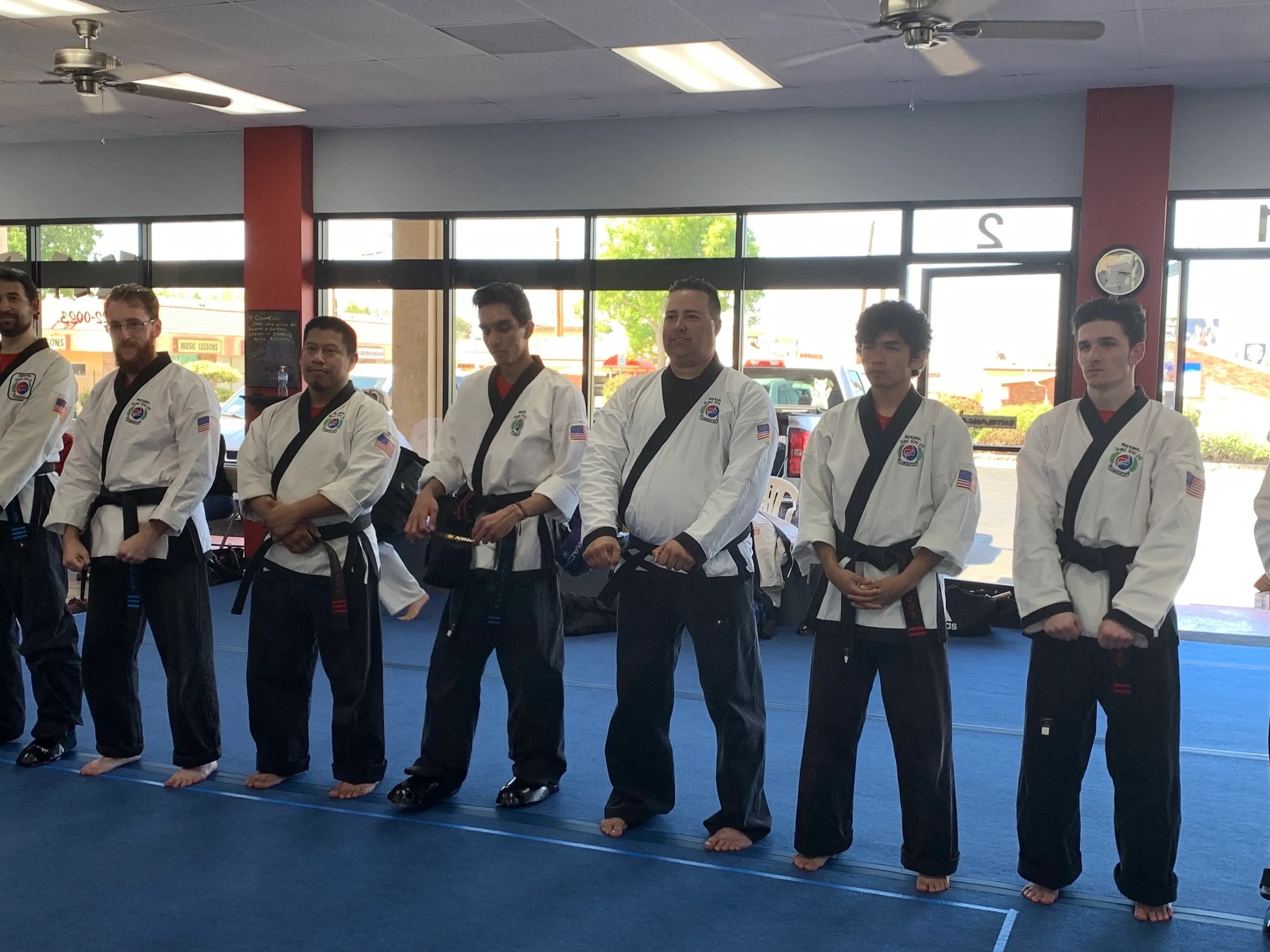 Martial arts students lined up in dojo